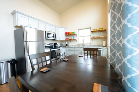 Fully stocked kitchen with keurig, coffee pot, and electric kettle.