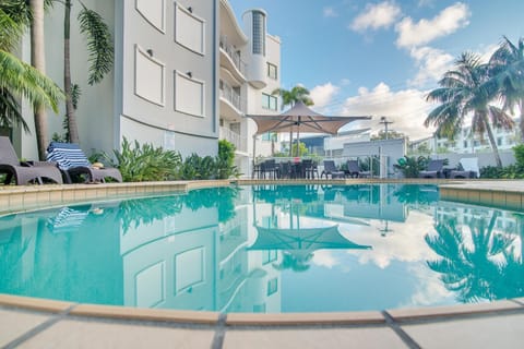 Outdoor pool, open 7:00 AM to 9:00 PM, pool umbrellas, sun loungers