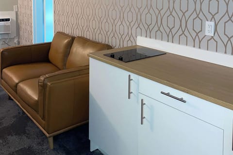 Deluxe Suite, 1 Queen Bed, Non Smoking | Premium bedding, individually decorated, individually furnished, desk