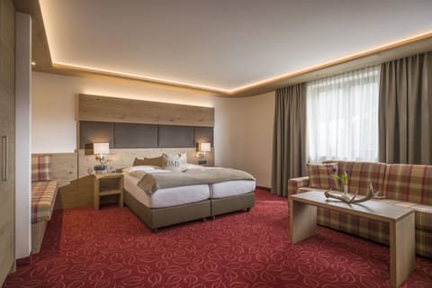 Family Room | Hypo-allergenic bedding, in-room safe, laptop workspace, free WiFi