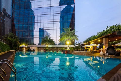 Outdoor pool, pool umbrellas, sun loungers