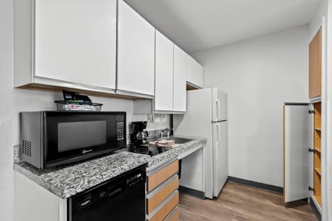 Suite, 1 Queen Bed with Sofa bed, Accessible, Non Smoking (Roll-In Shower) | Desk, blackout drapes, iron/ironing board, free cribs/infant beds