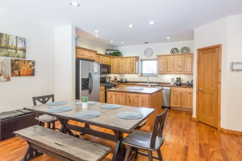 Fully-equipped kitchen with dining area.