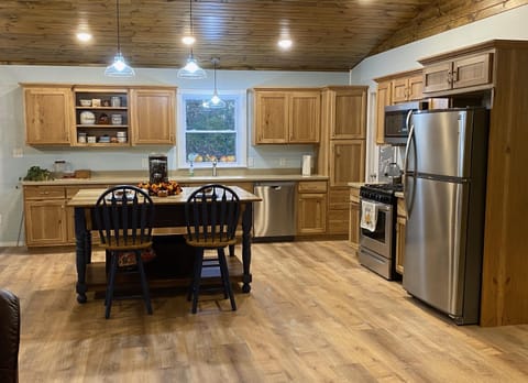 Fully stocked kitchen and Island with seating
