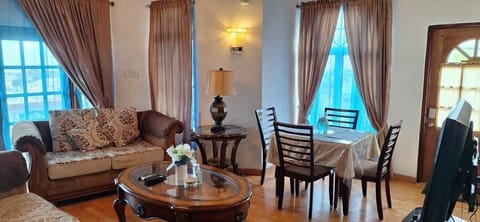 Three Bedroom Ocean View Villa | Living area | 50-inch LED TV with cable channels, Netflix, first-run movies