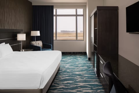 Deluxe Single Room | Pillowtop beds, minibar, in-room safe, desk