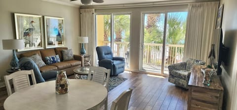 Beautiful view out the sliding doors to the inviting balcony.