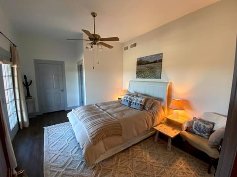 Master bedroom opening to back porch