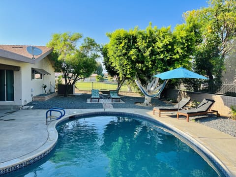 Pool area with views of the 11th hole of Indian Springs Golf Course