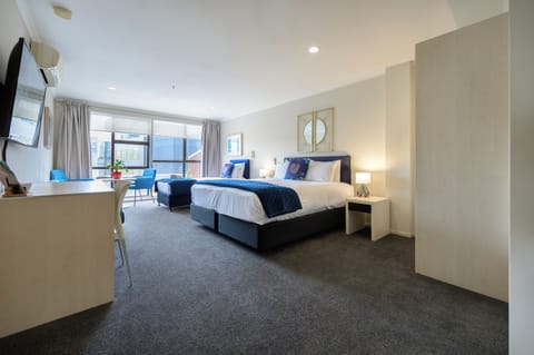 King Studio + 1 Single  | Down comforters, desk, blackout drapes, soundproofing