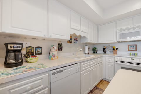 Kitchen with drop coffee maker