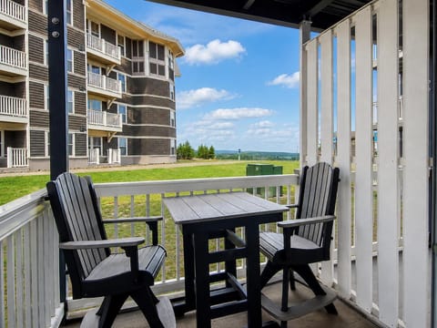 Experience Mountain Lodge 104 — a warm and welcoming mountain getaway where cozy evenings by the fireplace meet effortless slope access right outside your door.