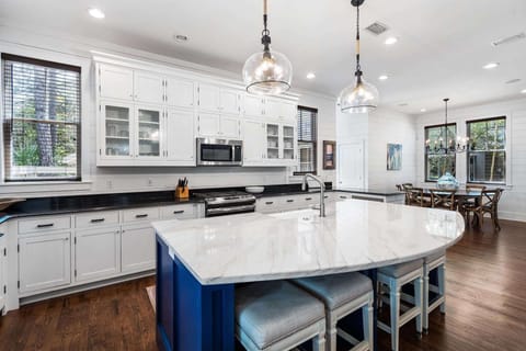 The large kitchen offers bar seating for 4