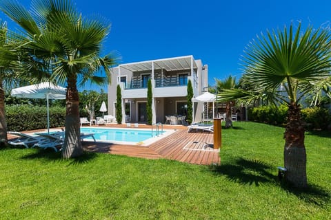 Lawn covered garden around the pool terrace!