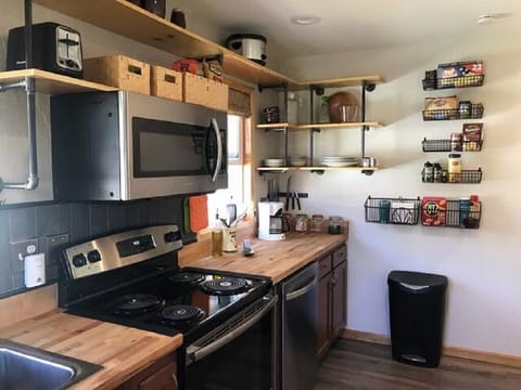 New stainless steel stove, microwave, dishwasher and amenities.