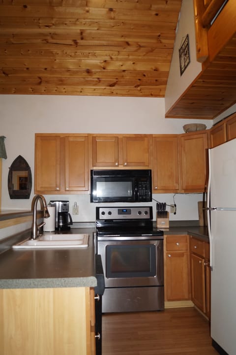 The kitchen is small, but mighty. We provide all dishes & cooking utensils.