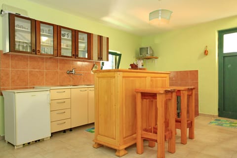 Cottage (Two Bedroom Stone House) | Private kitchen | Fridge