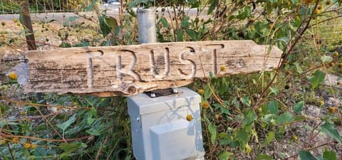 30amp electric hookup with water and sewer, firepit and trash barrel