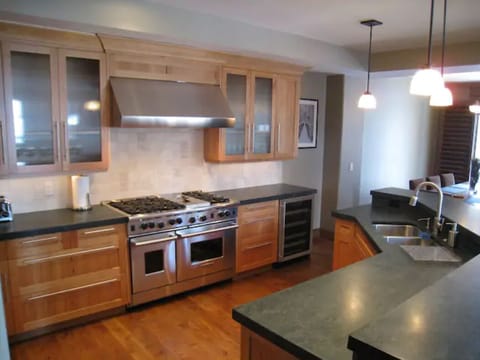 Gourmet kitchen with Wolf double oven, cooktop, griddle