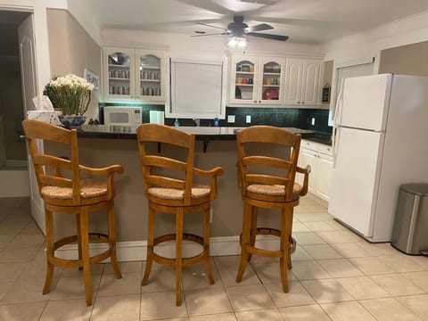 Bar seating in kitchen.