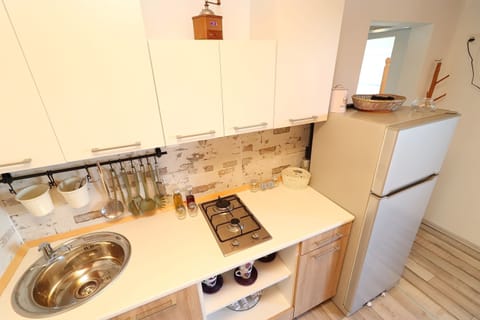 Cottage (Two Bedroom Holiday Home - Terrace an) | Private kitchen | Fridge, stovetop, cookware/dishes/utensils