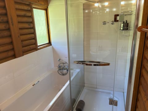 Family Room (Swiss Village) | Bathroom | Deep soaking tub, free toiletries, hair dryer, towels