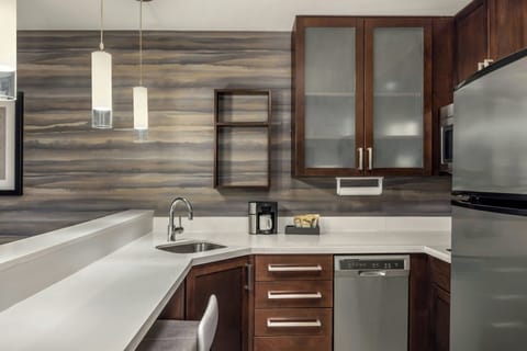 One-Bedroom Suite, 1 King Bed with Sofa Bed | Private kitchen | Fridge, microwave, stovetop, dishwasher