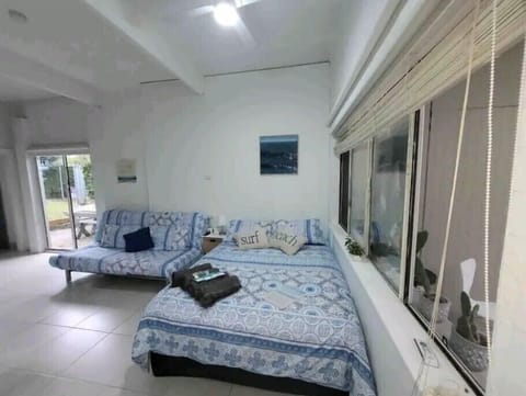 Flexible floor plan - Sofa converts to another queen bed.
