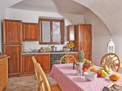 Cabinetry, Furniture, Property, Table, Countertop, Kitchen, Wood, Interior Design, Lighting, Window