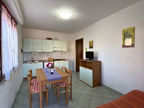 Property, Table, Furniture, Picture Frame, Wood, Interior Design, Floor, Flooring, Curtain, Houseplant