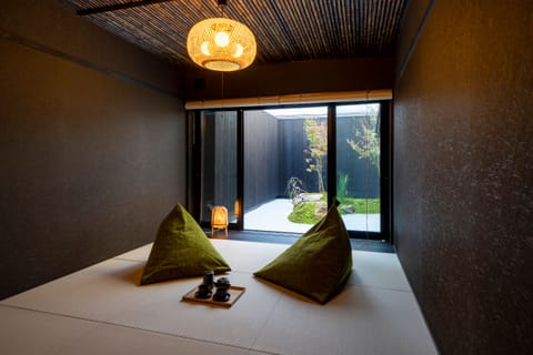 Sanjusangendo Yoinotake | Living area | 95-cm flat-screen TV with cable channels, TV, heated floors
