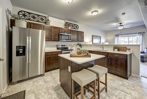 Kitchen with stainless steel appliances and Quartz counter tops