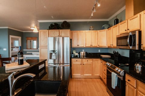 The spacious kitchen is great for preparing dinner together.
