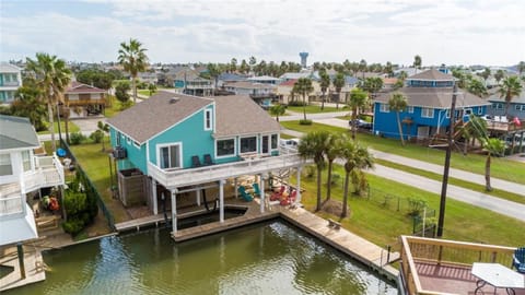 Rear of home, canal deck, boat slip and side yard - all fenced! Near the bay!