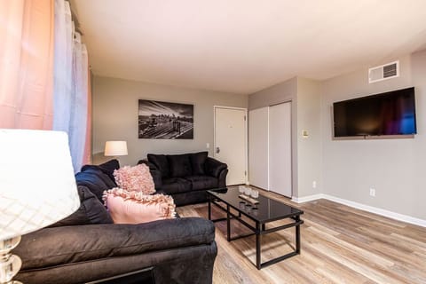 Spacious living room with full pull out couch. 
55" Roku Smart Tv