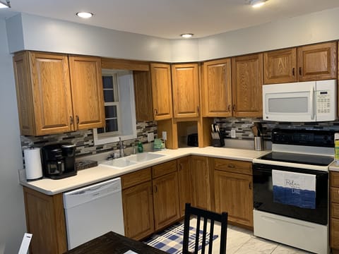 Updated kitchen fully stocked with everything needed to prepare any meal.