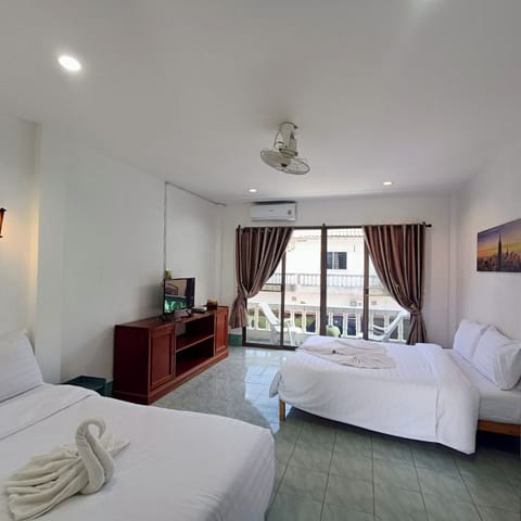 Family Quadruple Room, Kitchen, Garden Area | Hypo-allergenic bedding, in-room safe, desk, laptop workspace