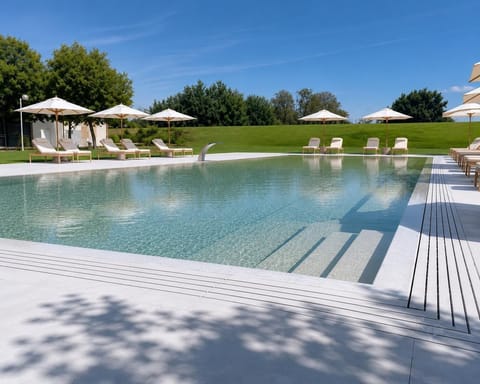 Seasonal outdoor pool, open 7:00 AM to 8:00 PM, sun loungers