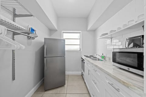 Deluxe Queen Studio w/ Kitchen & Sofa Bed | Private kitchen | Fridge, microwave, coffee/tea maker, toaster