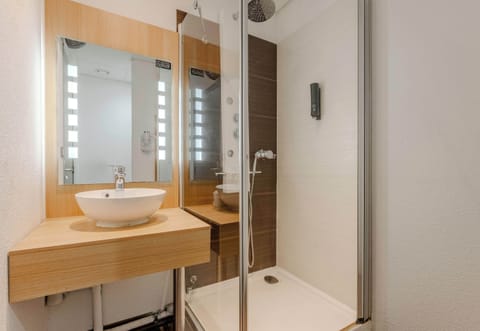 Shower, towels, soap, toilet paper