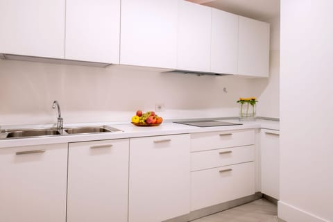 Luxury Apartment | Private kitchen | Mini-fridge, dishwasher, espresso maker, coffee/tea maker