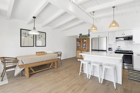 Upstairs - great dining space for 8 people plus kitchen island seats 3.  
