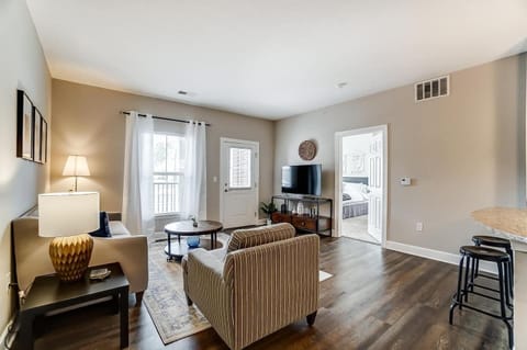 Another view of the living room and patio door.