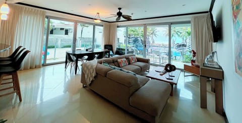 Large open concept living area with direct pool access with beach access too!!