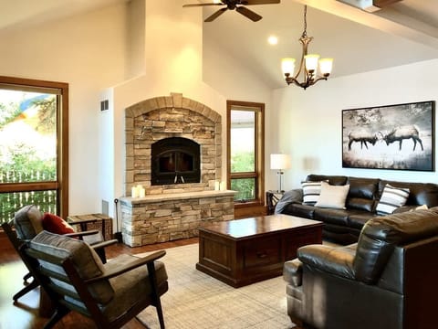 Living Room with fireplaces and lake viewsKitchen