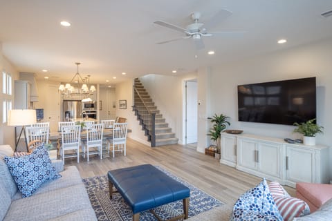 Living Room Seating View - The Living Room is located adjacent to the dining room and is the perfect place to relax and watch your favorite movie or TV program.