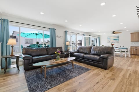 Surf View Upper Living Room
Gather together in the spacious Surf View living room featuring comfortable seating, open-concept design, and room for the whole group to relax.