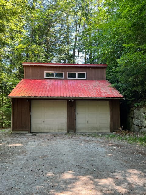 Garage at end of the road as you arrive at the house.