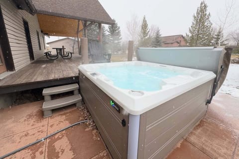 The private hot tub, located in the backyard, is a luxurious way to unwind after adventuring in the Tetons.