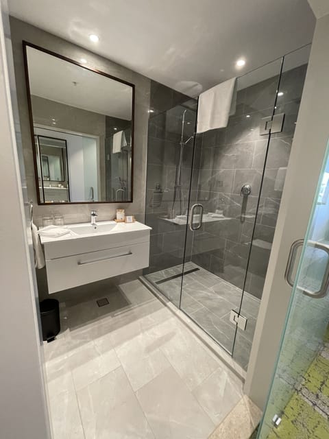 Shower, rainfall showerhead, eco-friendly toiletries, hair dryer